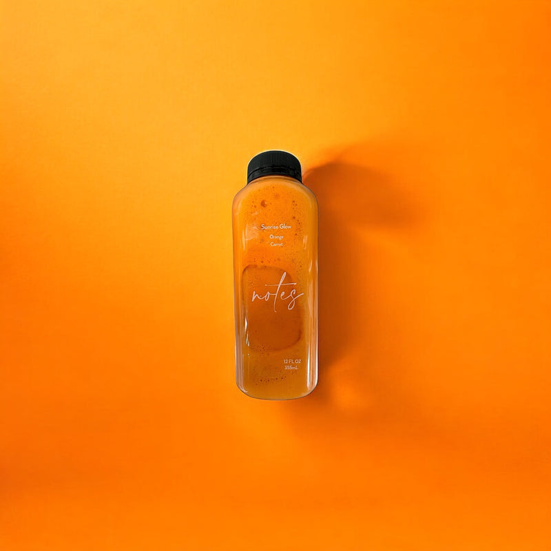 Sunrise Glow: Rise and Shine with Our Energizing Orange Carrot Juice Blend